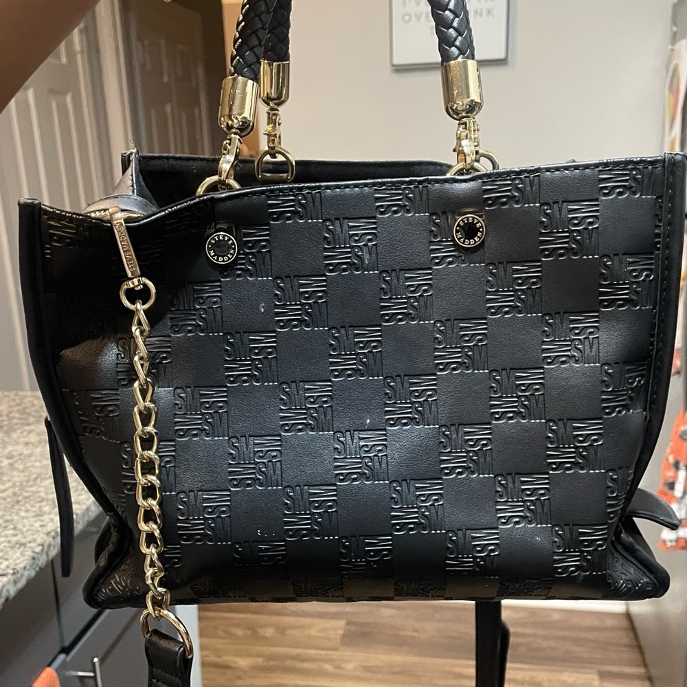 Elegant Black Handbag with Gold Details